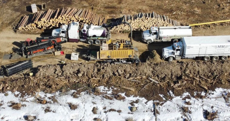 Calgary and Edmonton construction company at Alberta worksite aerial shot.